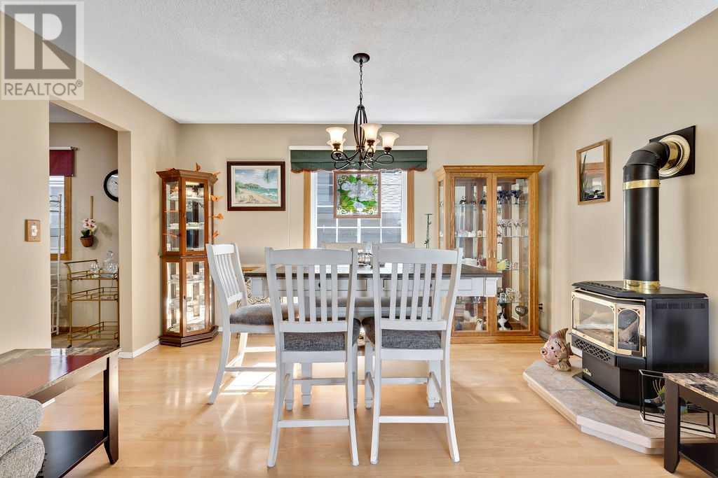 Single Family House Bungalow for Sale in  Sundown Green SE Sundance Calgary 