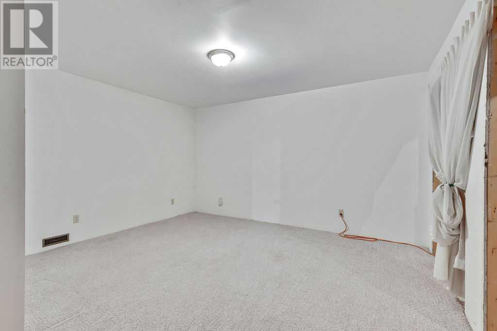 Single Family House Bungalow for Sale in  Sundown Green SE Sundance Calgary 