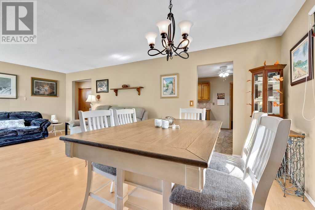 Single Family House Bungalow for Sale in  Sundown Green SE Sundance Calgary 