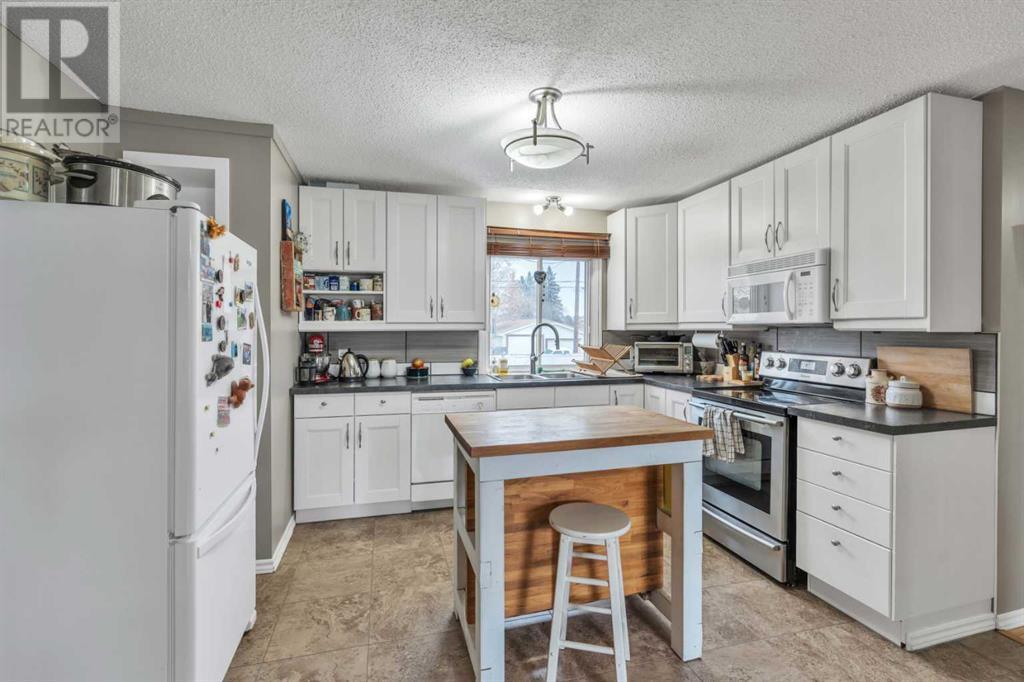 Photo 3 of 8508 8512 Bowness Road Nw, Calgary AB