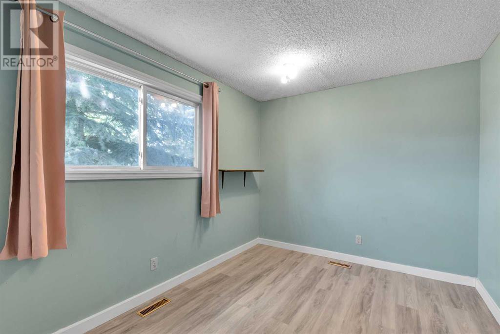 Single Family House Bungalow for Sale in  Dalrymple Crescent NW Dalhousie Calgary 