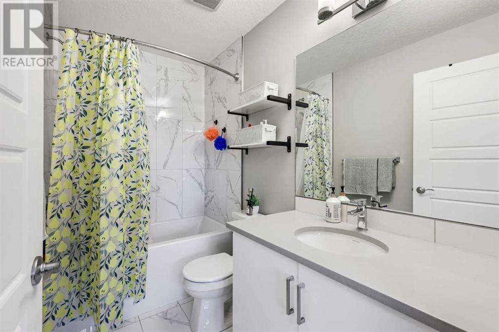 Single Family House for Sale in   Belmont Drive SW Belmont Calgary 