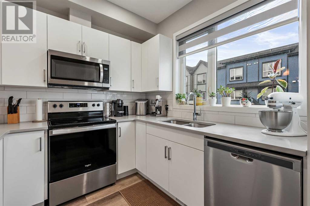 Single Family House for Sale in   Belmont Drive SW Belmont Calgary 