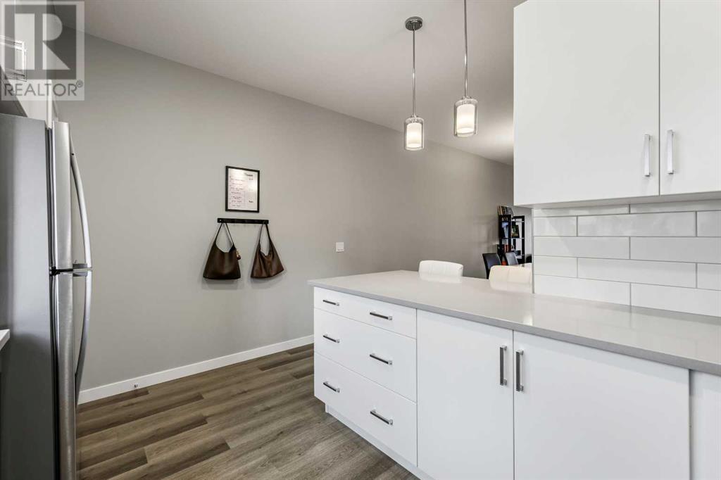 Single Family House for Sale in   Belmont Drive SW Belmont Calgary 