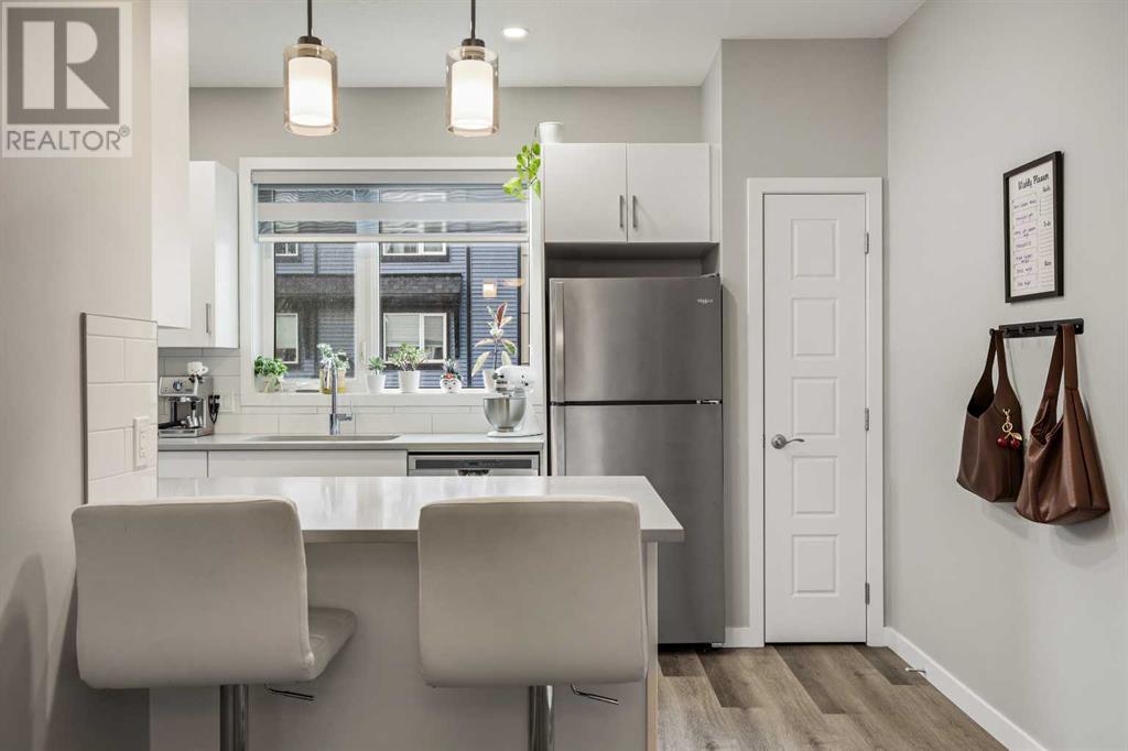 Single Family House for Sale in   Belmont Drive SW Belmont Calgary 