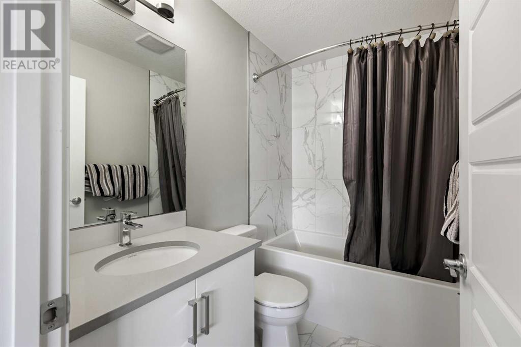Single Family House for Sale in   Belmont Drive SW Belmont Calgary 