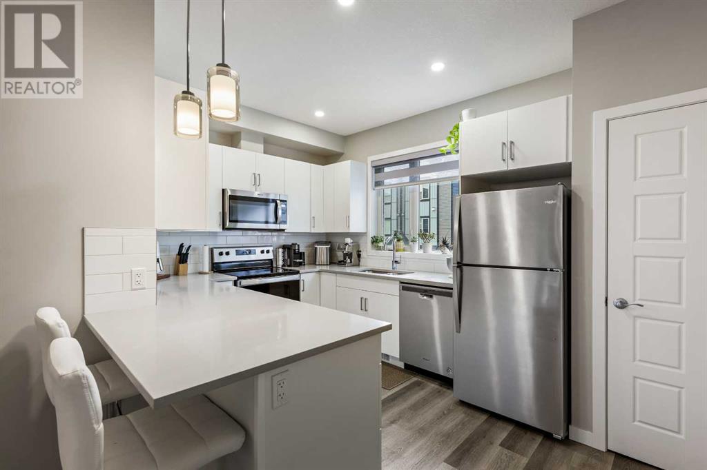Single Family House for Sale in   Belmont Drive SW Belmont Calgary 