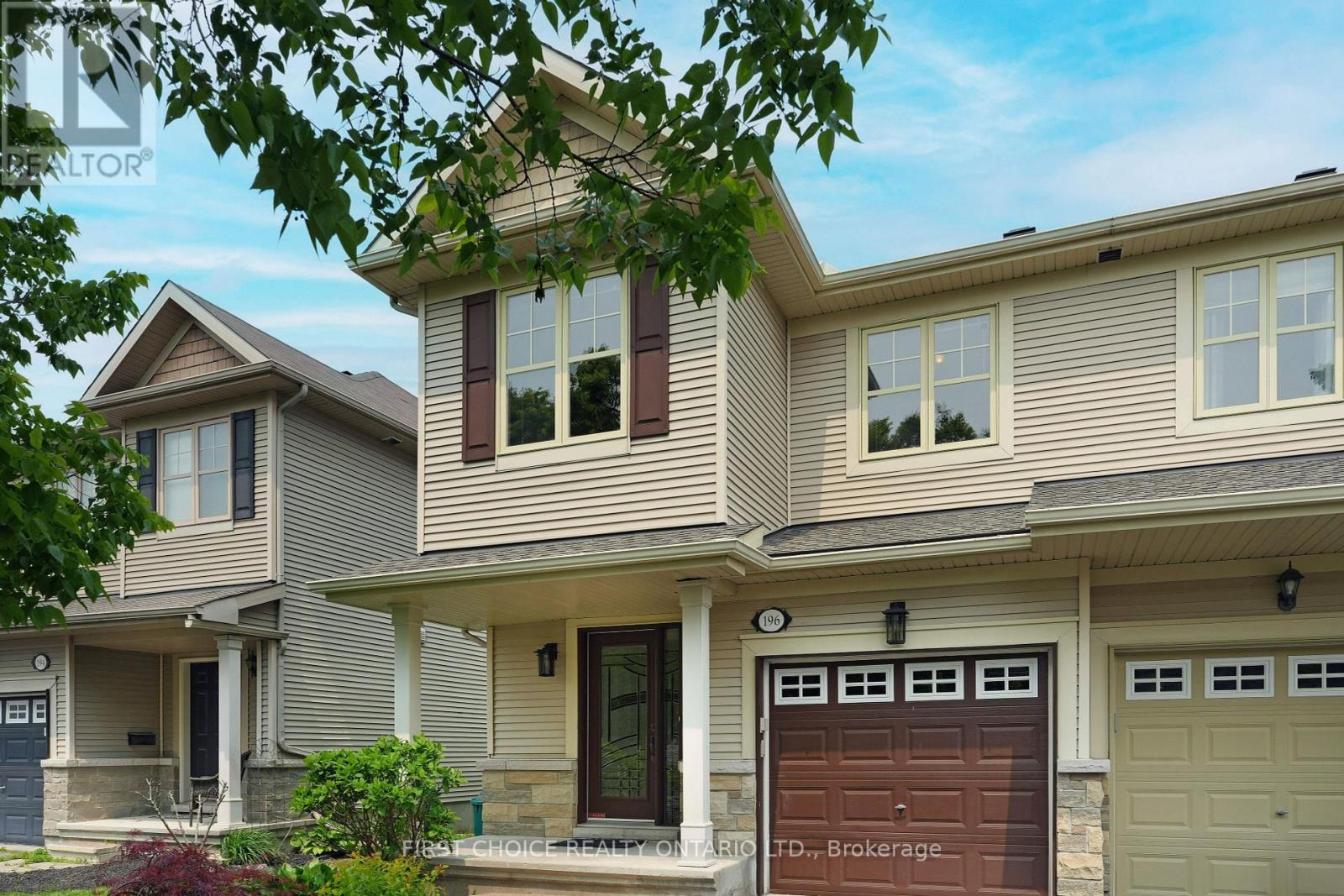 Like New with new premium flooring on all 3 floors