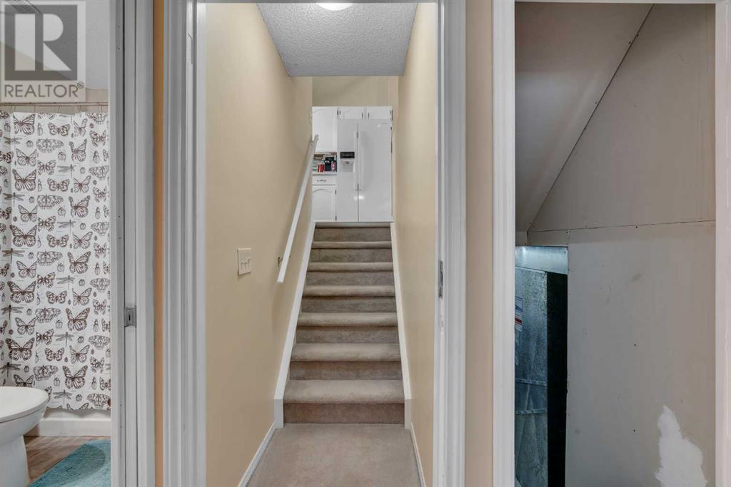 Single Family House 4 Level for Sale in  Covington Rise NE Coventry Hills Calgary 
