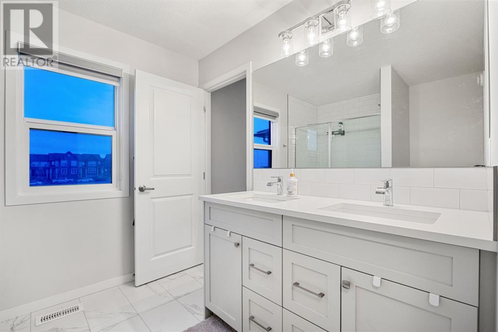 Single Family House for Sale in  Herron Mews NE Livingston Calgary 