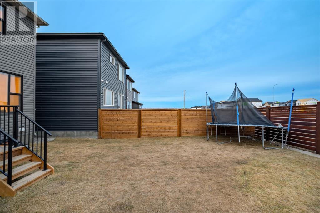 Single Family House for Sale in  Herron Mews NE Livingston Calgary 
