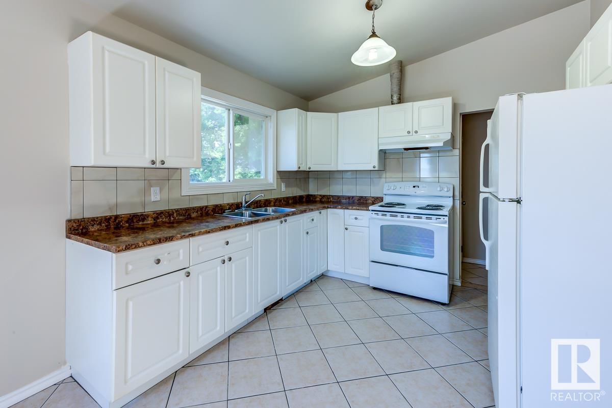 Single Family House Bi-level for Sale in     AV NW Edmonton 