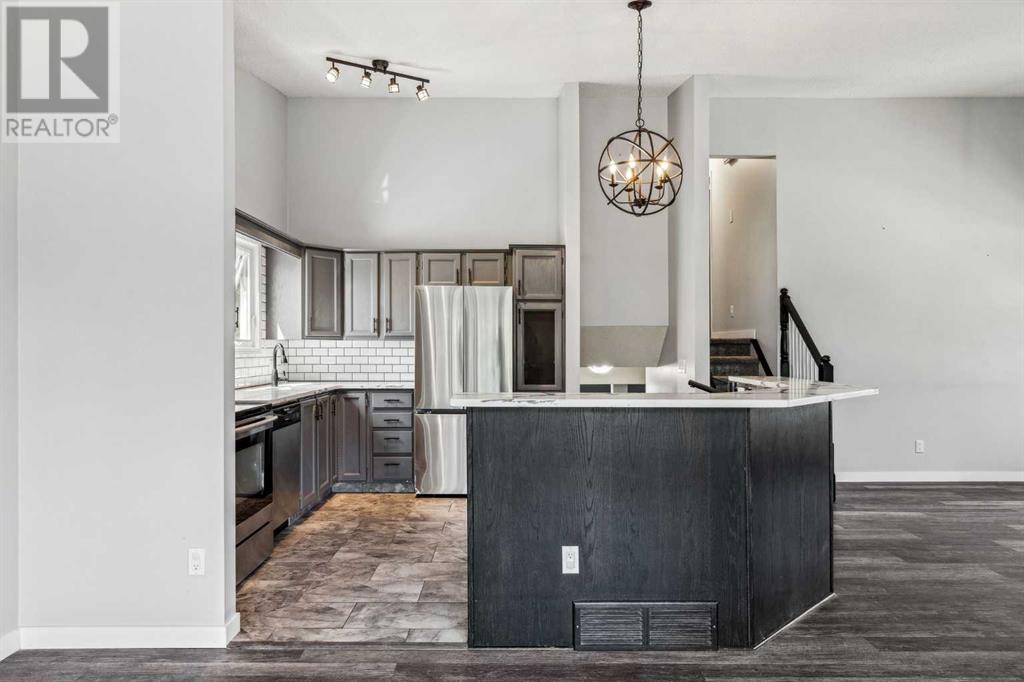 Single Family House 4 Level for Sale in  Hawkley Valley Road NW Hawkwood Calgary 
