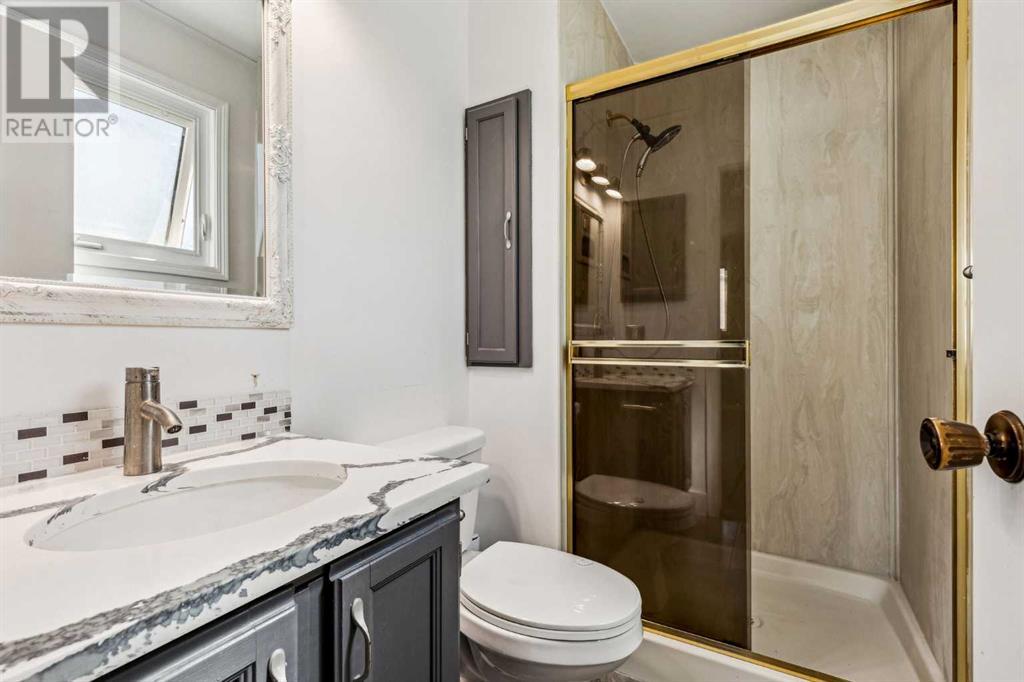 Single Family House 4 Level for Sale in  Hawkley Valley Road NW Hawkwood Calgary 