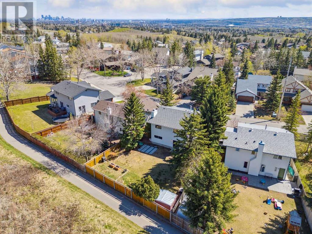 Single Family House 4 Level for Sale in  Hawkley Valley Road NW Hawkwood Calgary 