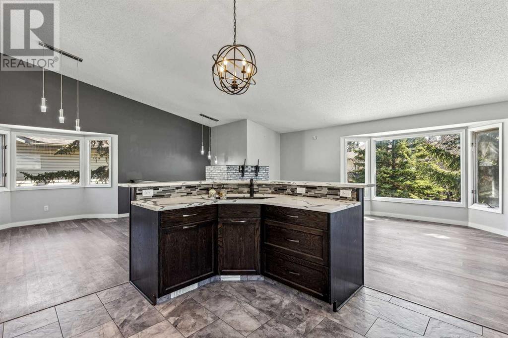 Single Family House 4 Level for Sale in  Hawkley Valley Road NW Hawkwood Calgary 