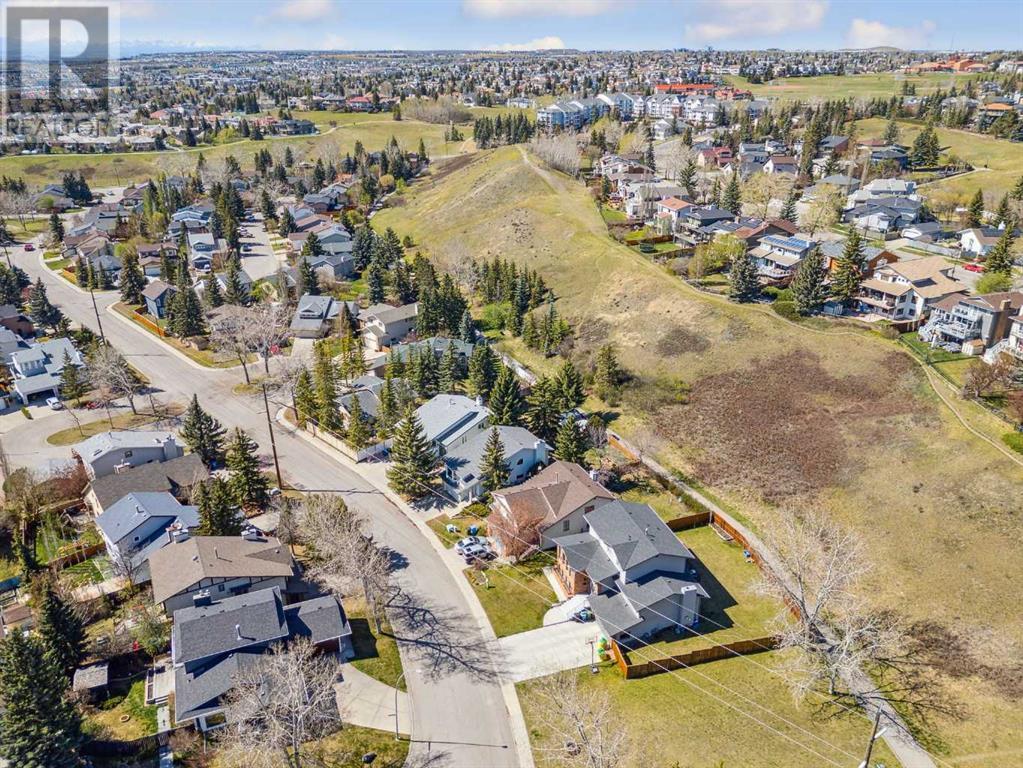 Single Family House 4 Level for Sale in  Hawkley Valley Road NW Hawkwood Calgary 