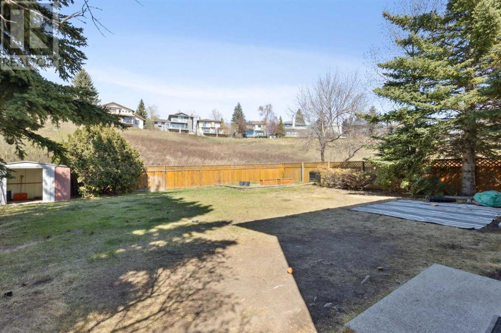 Single Family House 4 Level for Sale in  Hawkley Valley Road NW Hawkwood Calgary 