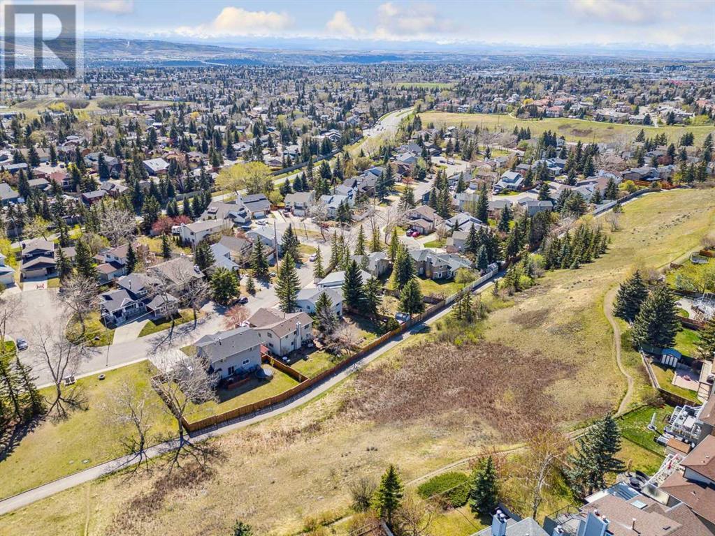 Single Family House 4 Level for Sale in  Hawkley Valley Road NW Hawkwood Calgary 