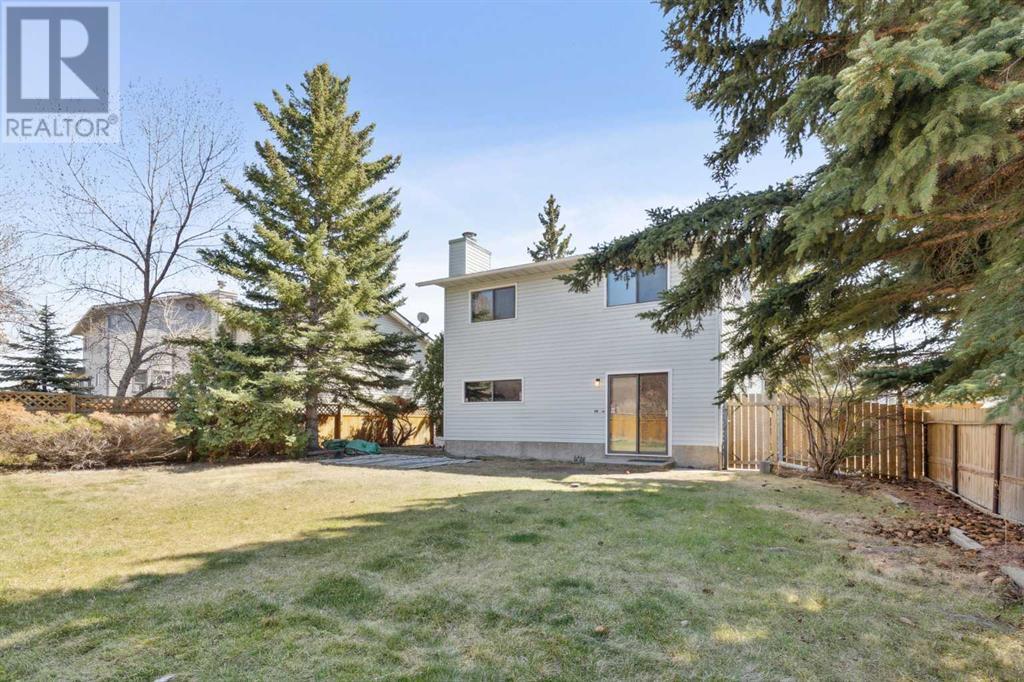 Single Family House 4 Level for Sale in  Hawkley Valley Road NW Hawkwood Calgary 