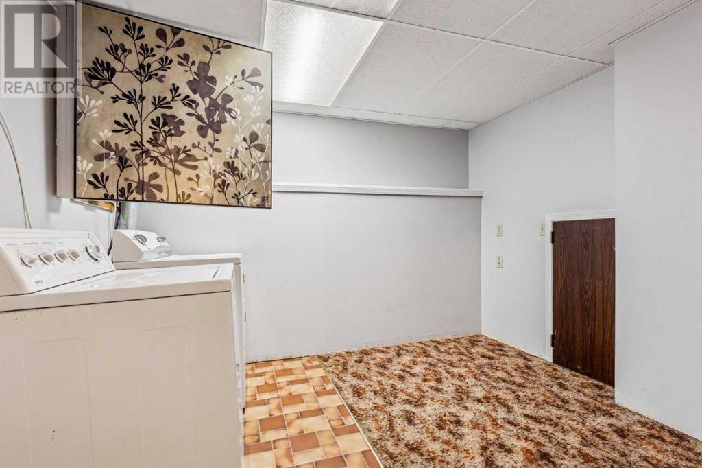 Single Family House 4 Level for Sale in  Hawkley Valley Road NW Hawkwood Calgary 
