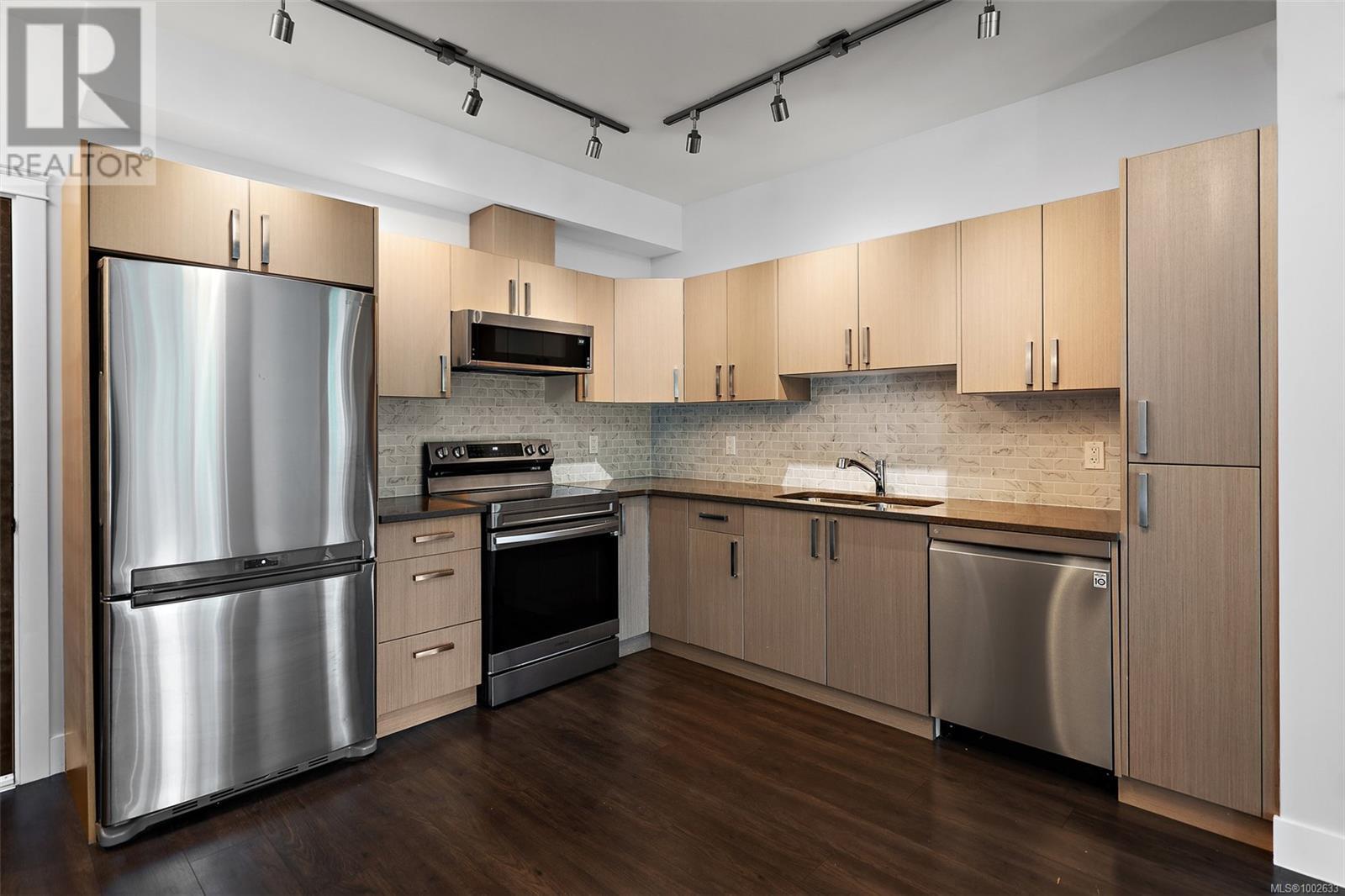 Photo 5 of 205 1900 Watkiss Way, View Royal BC