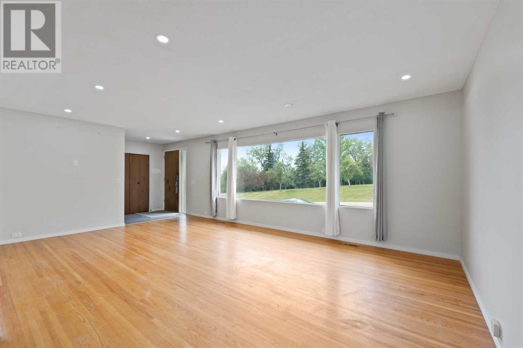 Single Family House 4 Level for Sale in  Barrett Drive NW Brentwood Calgary 