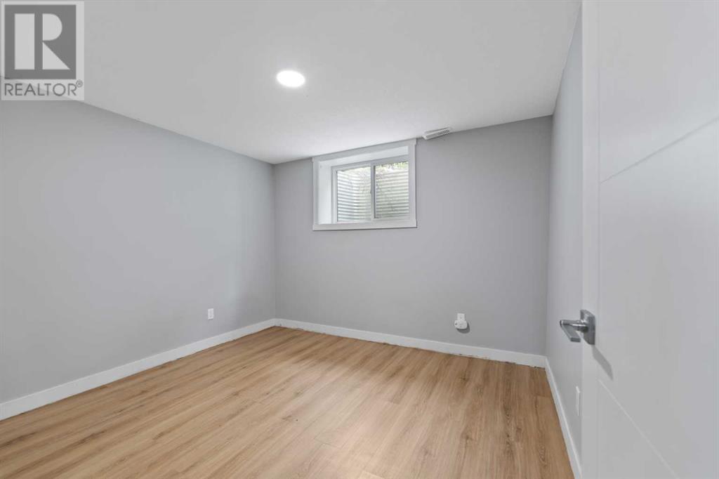 Single Family House 4 Level for Sale in  Barrett Drive NW Brentwood Calgary 