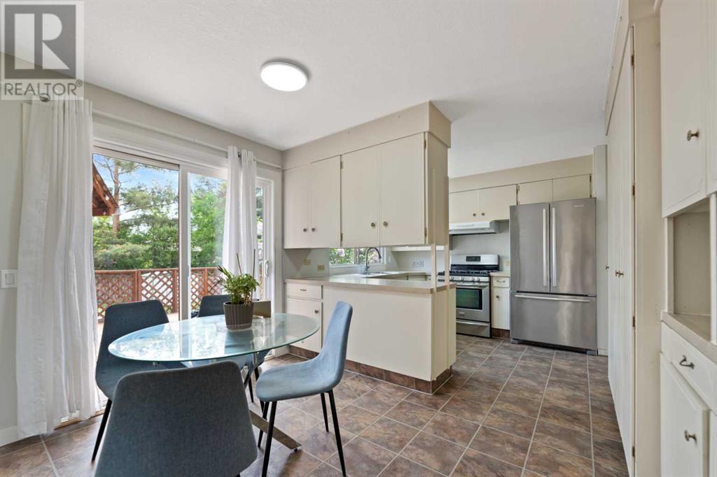 Single Family House 4 Level for Sale in  Barrett Drive NW Brentwood Calgary 