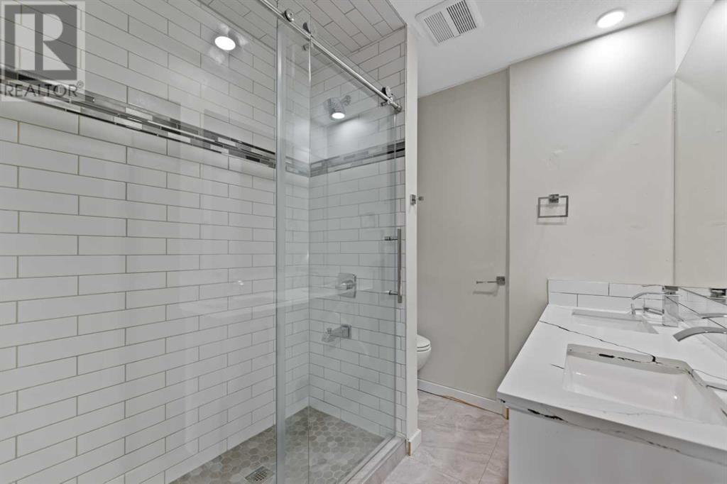 Single Family House 4 Level for Sale in  Barrett Drive NW Brentwood Calgary 