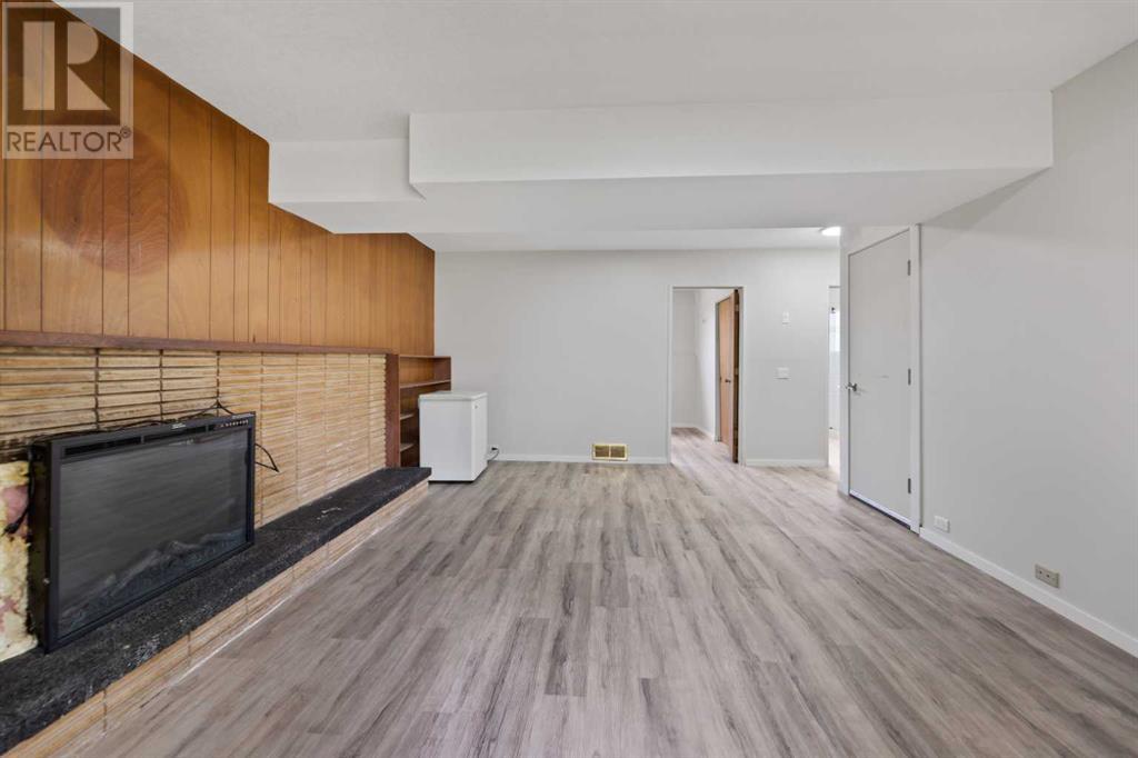 Single Family House 4 Level for Sale in  Barrett Drive NW Brentwood Calgary 