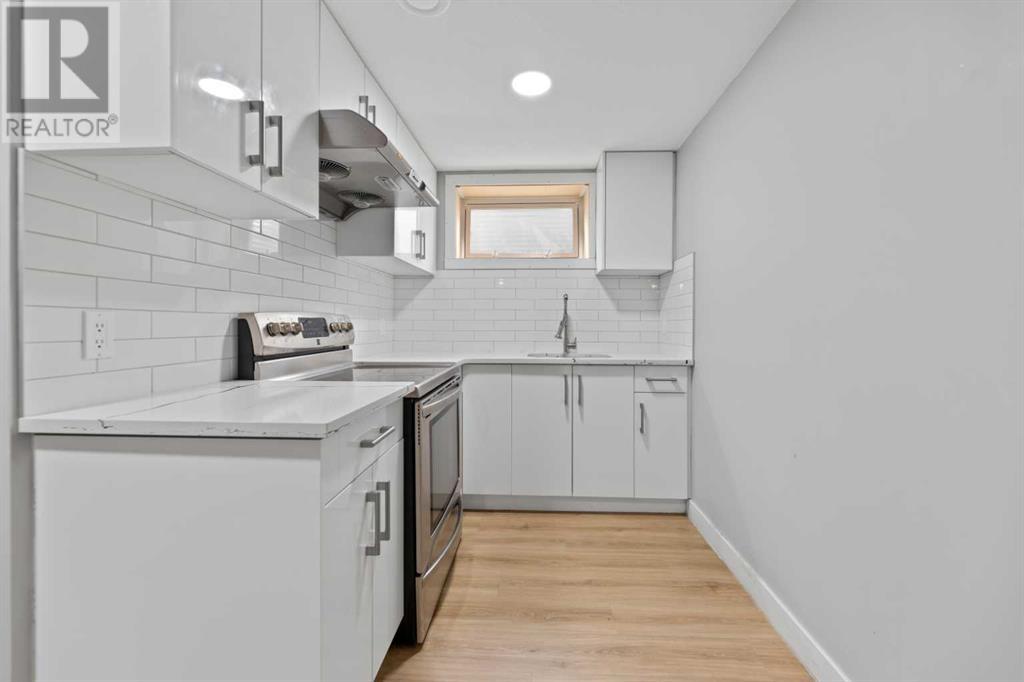 Single Family House 4 Level for Sale in  Barrett Drive NW Brentwood Calgary 