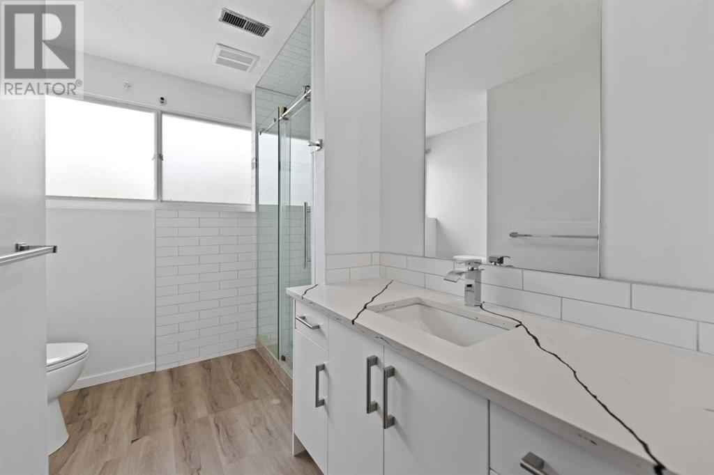 Single Family House 4 Level for Sale in  Barrett Drive NW Brentwood Calgary 