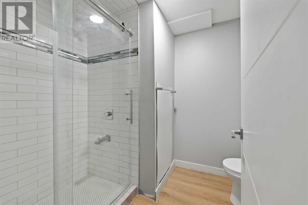 Single Family House 4 Level for Sale in  Barrett Drive NW Brentwood Calgary 