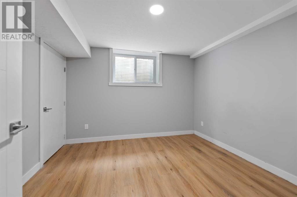 Single Family House 4 Level for Sale in  Barrett Drive NW Brentwood Calgary 
