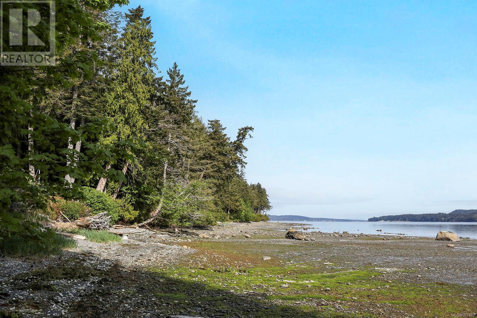 Photo 64 of 7820 Ships Point Rd, Fanny Bay BC