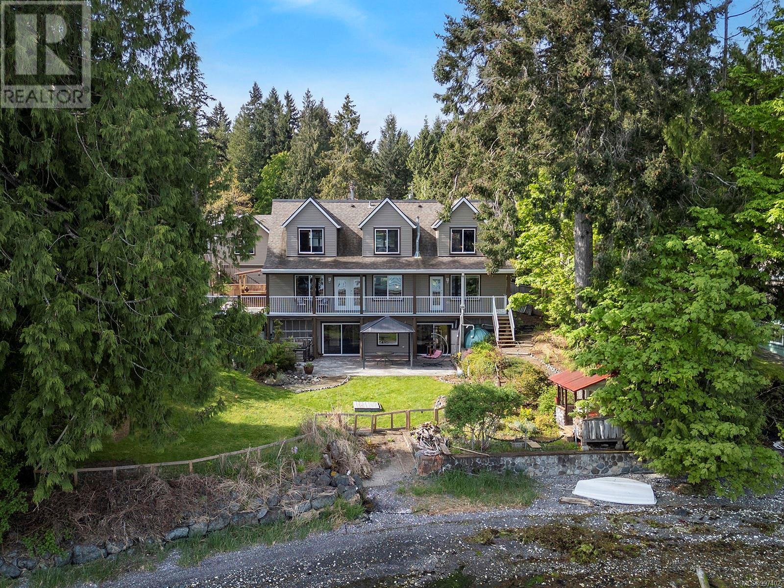 Photo 70 of 7820 Ships Point Rd, Fanny Bay BC