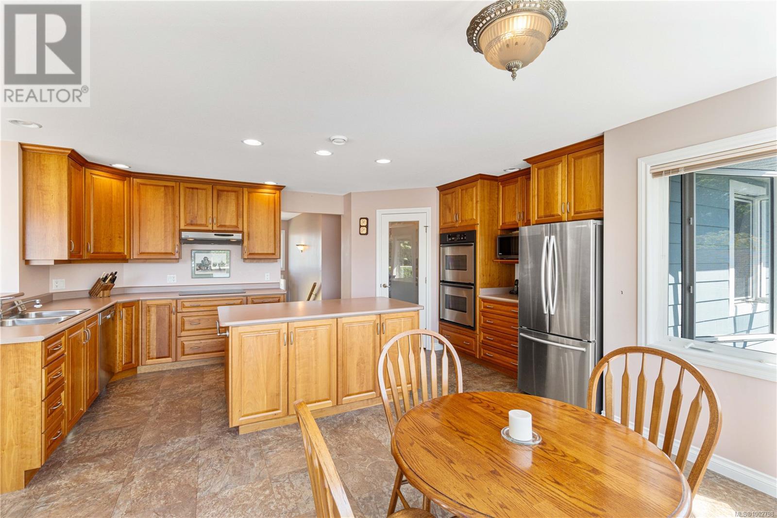 Photo 11 of 5384 Deep Bay Dr, Bowser BC