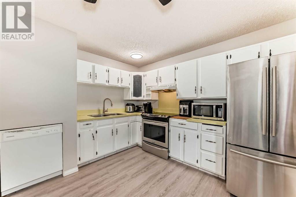 Single Family House Bi-level for Sale in  Canfield Crescent SW Canyon Meadows Calgary 
