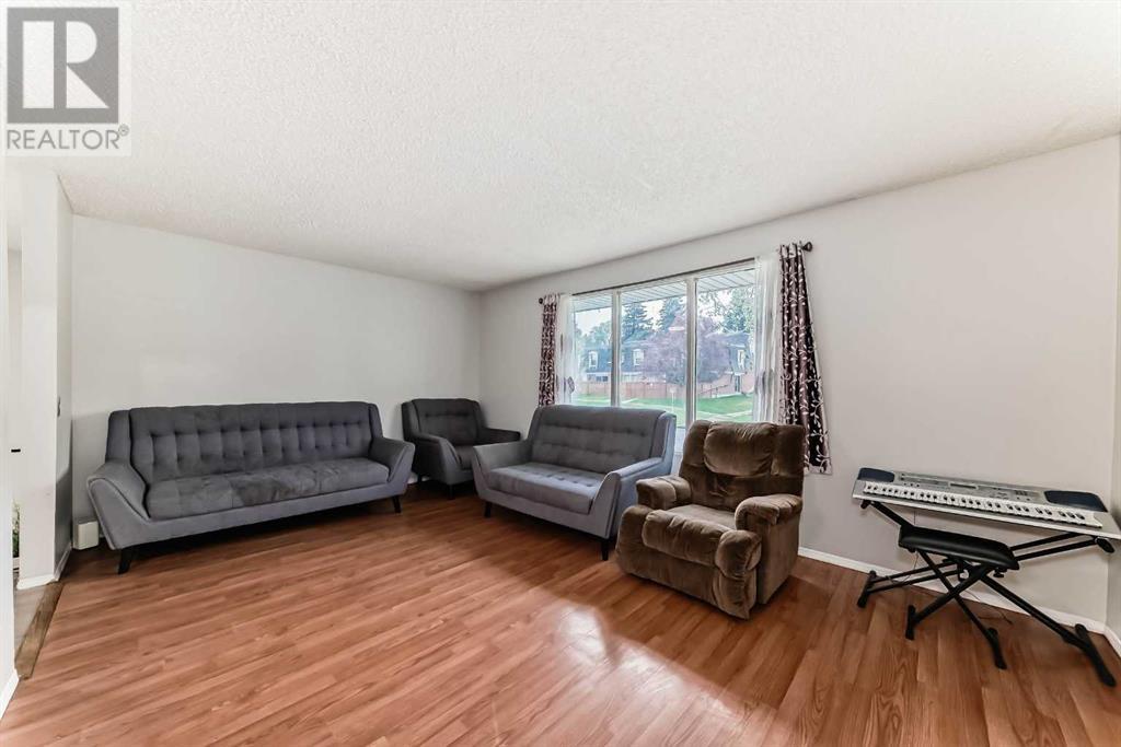 Single Family House Bi-level for Sale in  Canfield Crescent SW Canyon Meadows Calgary 