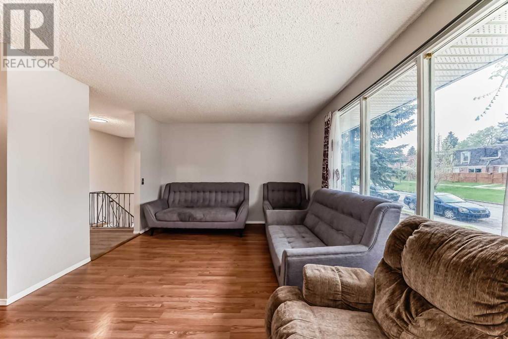 Single Family House Bi-level for Sale in  Canfield Crescent SW Canyon Meadows Calgary 