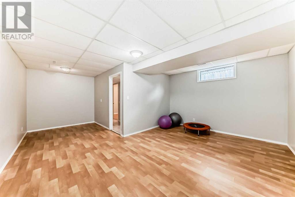 Single Family House Bi-level for Sale in  Canfield Crescent SW Canyon Meadows Calgary 