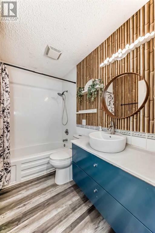 Single Family House Bi-level for Sale in  Canfield Crescent SW Canyon Meadows Calgary 