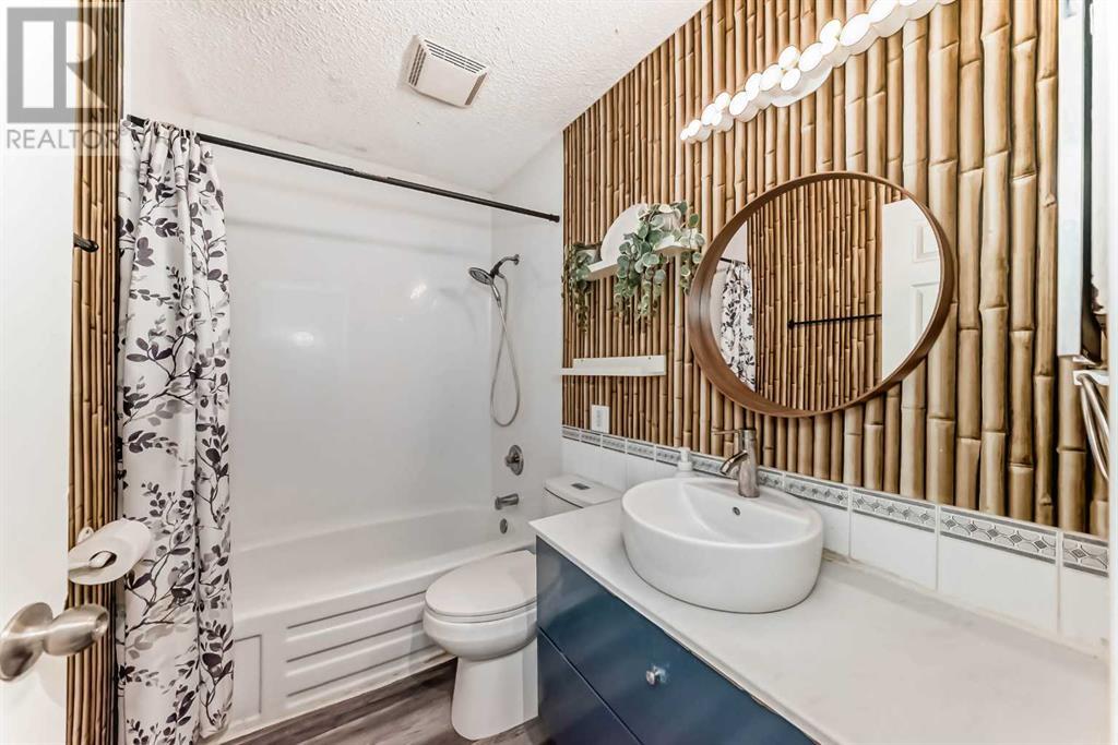 Single Family House Bi-level for Sale in  Canfield Crescent SW Canyon Meadows Calgary 
