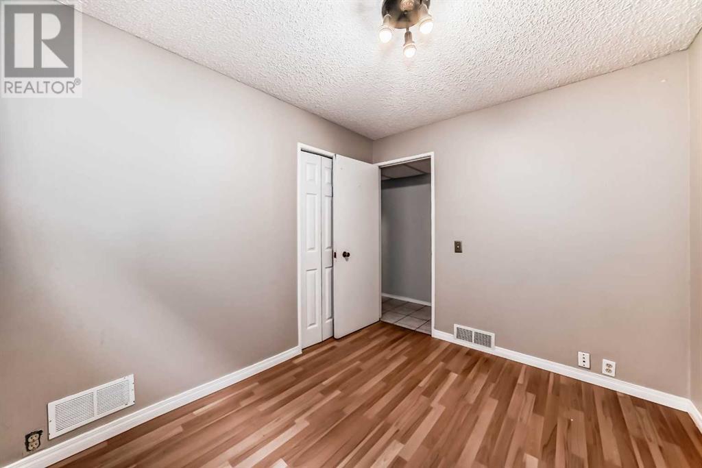 Single Family House Bi-level for Sale in  Canfield Crescent SW Canyon Meadows Calgary 