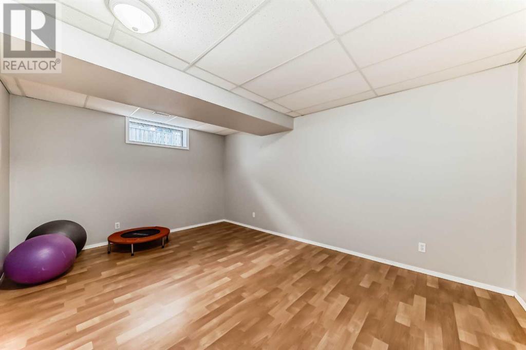 Single Family House Bi-level for Sale in  Canfield Crescent SW Canyon Meadows Calgary 
