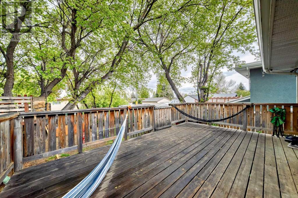 Single Family House Bi-level for Sale in  Canfield Crescent SW Canyon Meadows Calgary 