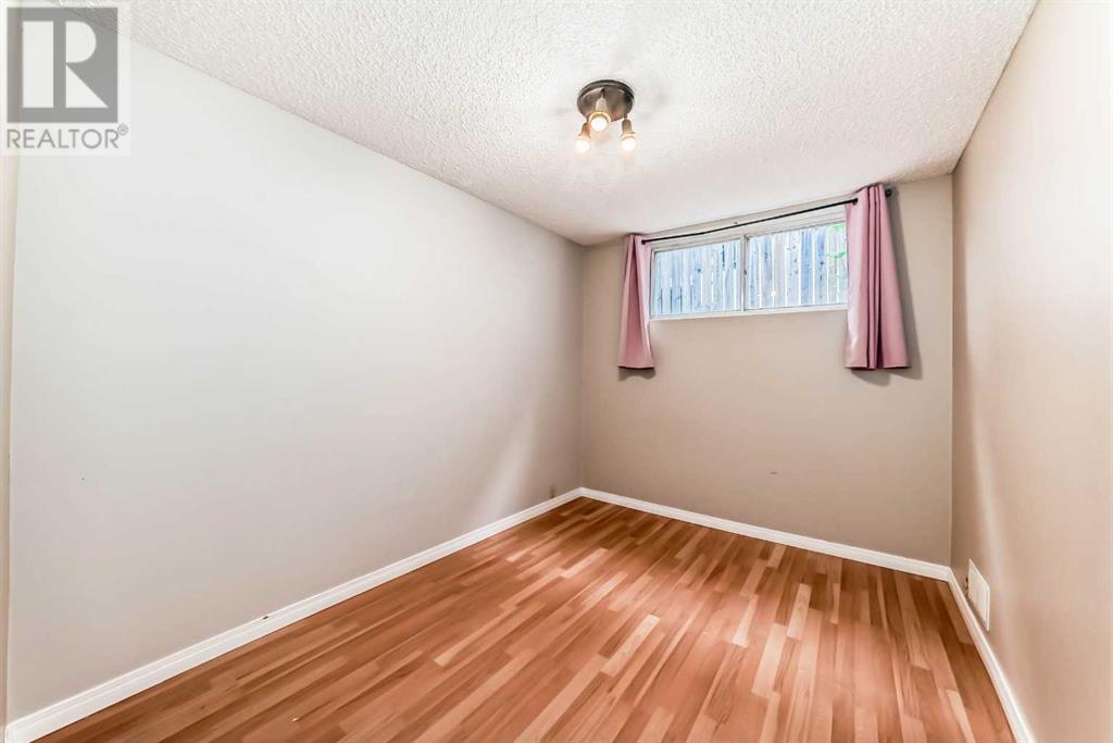 Single Family House Bi-level for Sale in  Canfield Crescent SW Canyon Meadows Calgary 