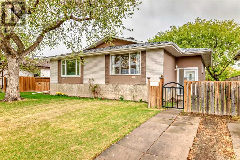 Single Family House Bi-level for Sale in  Canfield Crescent SW Canyon Meadows Calgary 