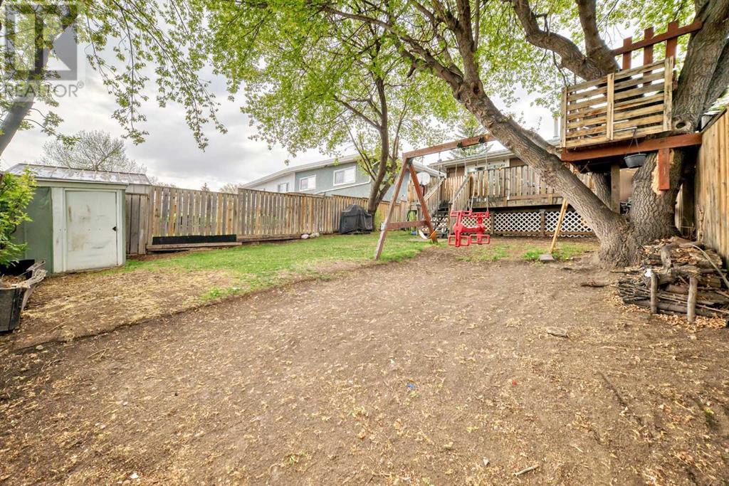 Single Family House Bi-level for Sale in  Canfield Crescent SW Canyon Meadows Calgary 